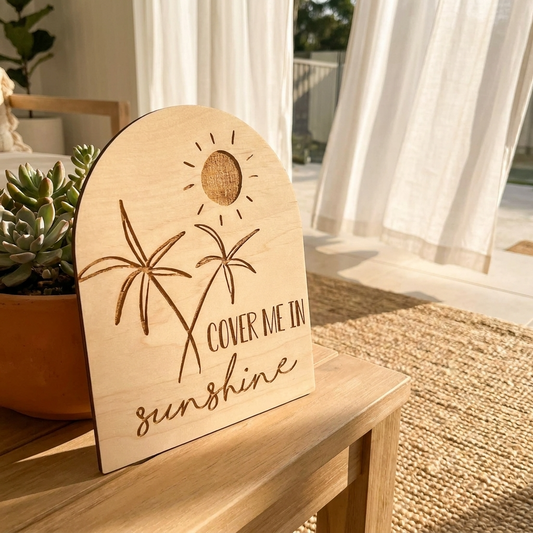 cover me in sunshine arch sign