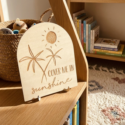 cover me in sunshine arch sign